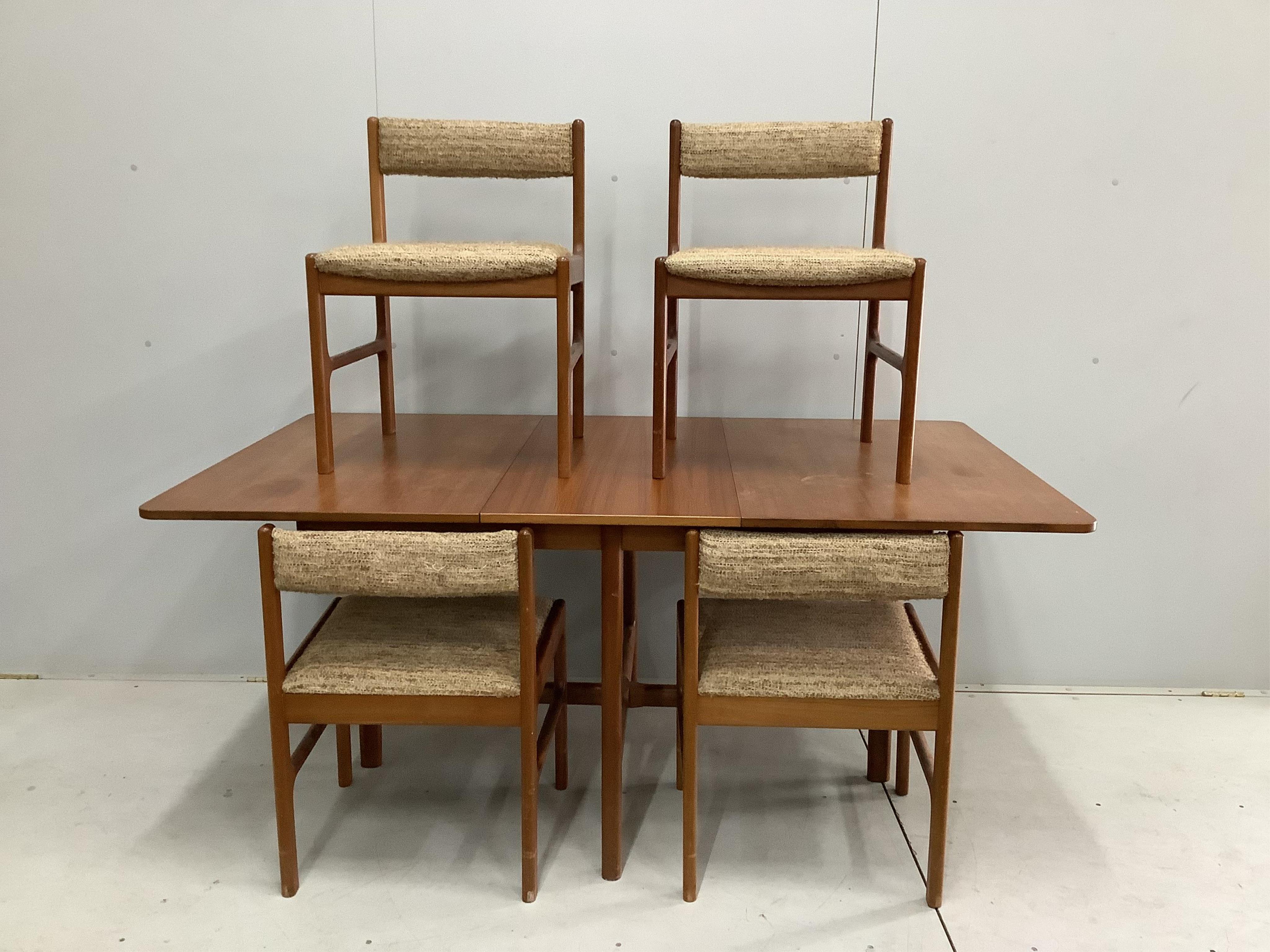 A mid century Danish style MacIntosh Forfar teak sideboard, width 170cm, depth 46cm, height 102cm together with a McIntosh teak extending dining table and four chairs teak sideboard, width 170cm, depth 46cm, height 102cm